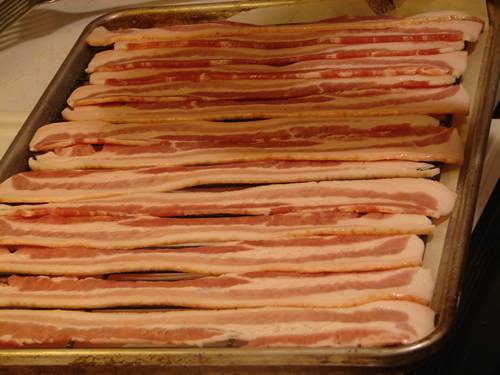 uncooked bacon slices