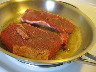 new york strip steak in calphalon 12 inch